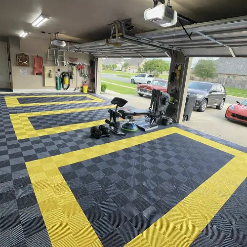 Black and grey interlocking PVC garage tiles in Al Jurf Ajman villa
