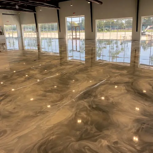 Decorative microcement showroom flooring installed in Al Bateen Abu Dhabi